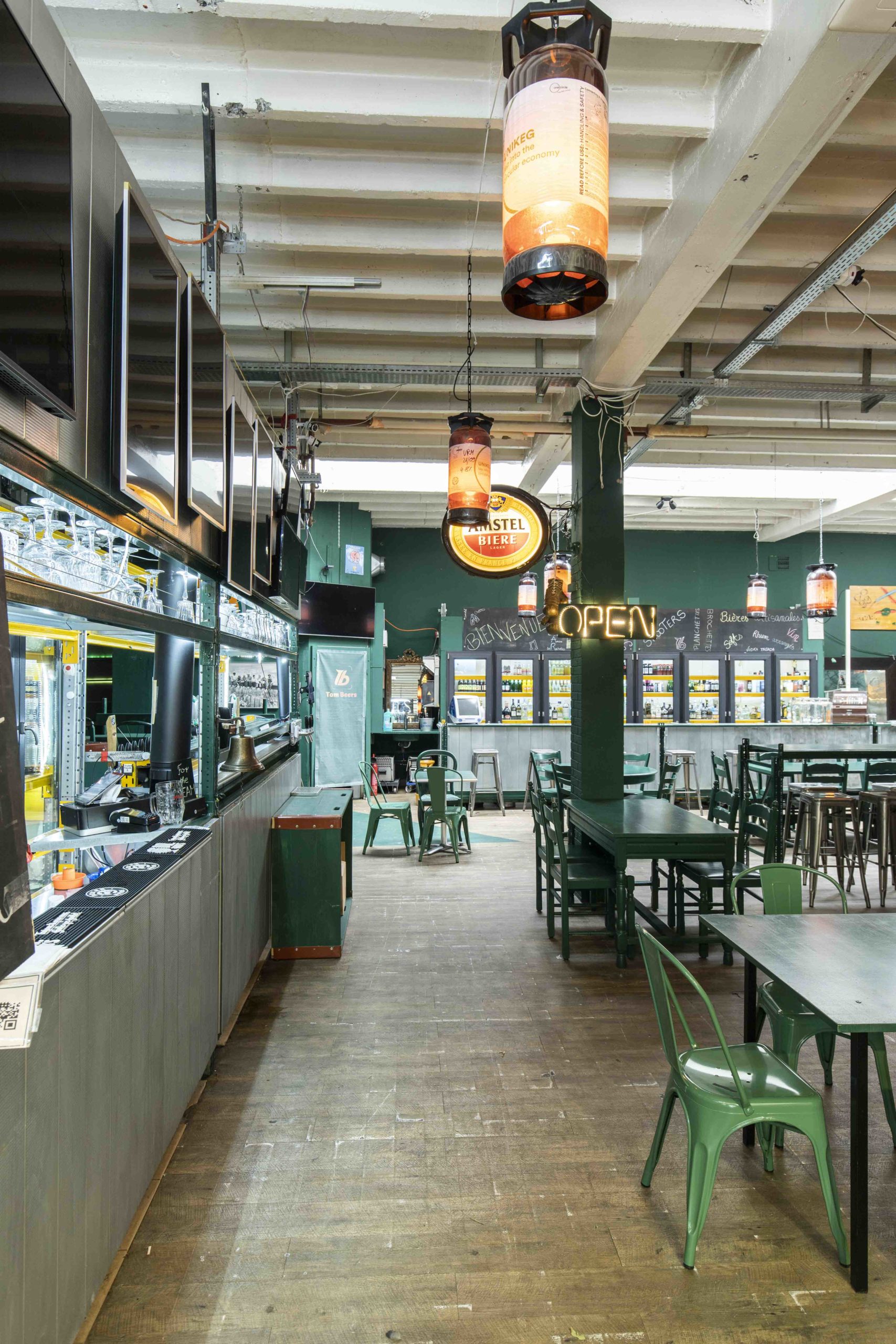 photo d’un projet d’architecte d’intérieur à Genève : Tom's beer , arcade commerciale