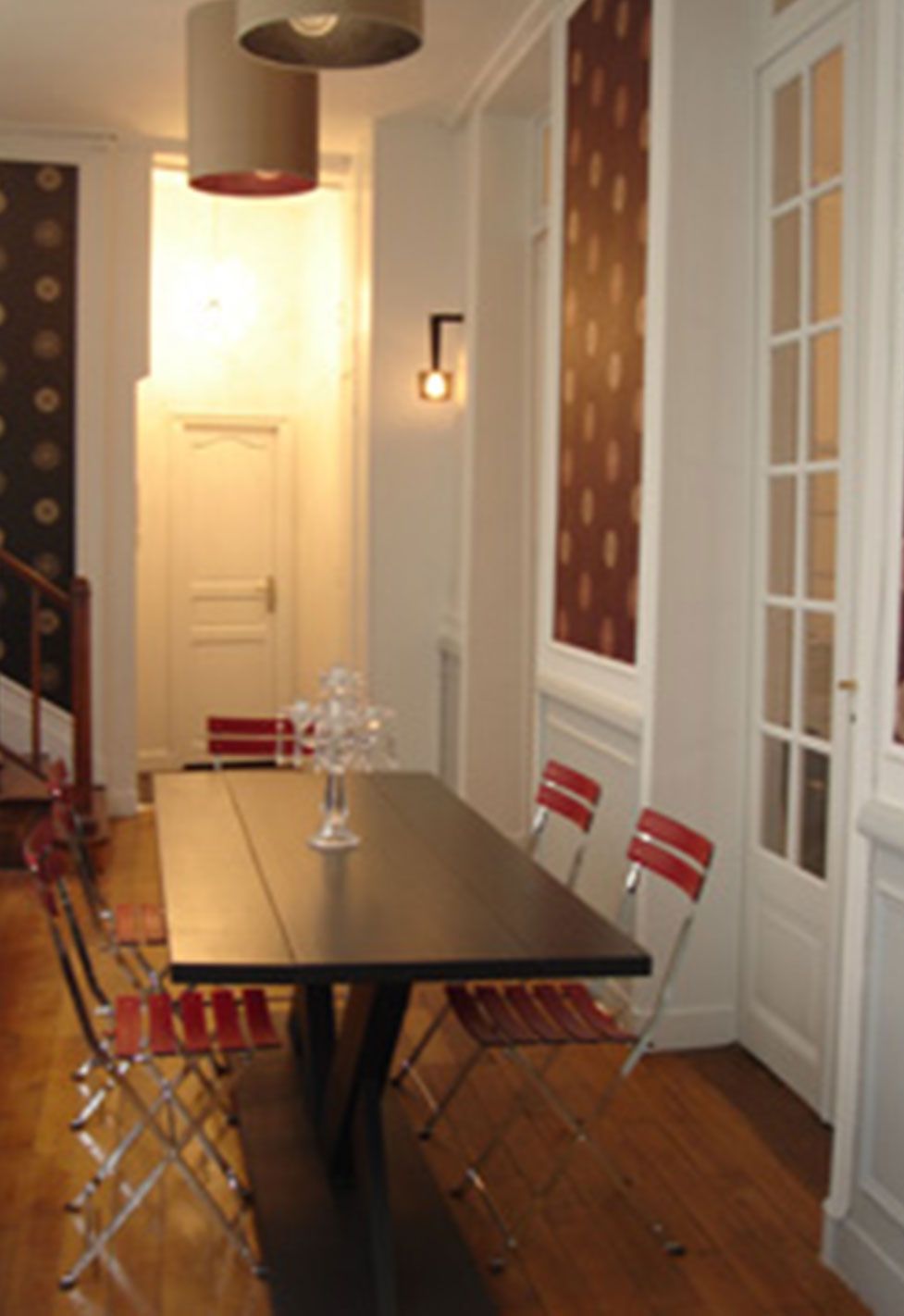 Salle à manger d'un appartement ancien à Paris 6ème. Réalisation ID Interior Design par Anne-Laure Ferry-Adam, architecte d'intérieur à Genève.